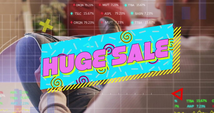 Asian man scrolling tablet on sofa in living room, with HUGE SALE banner and chart overlays