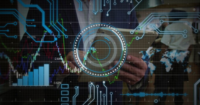 Presenting suited professional holding tablet in office, with data overlays and world map display