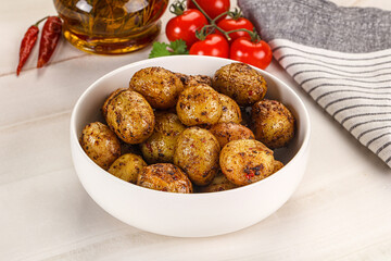 Baked mini potato with herbs