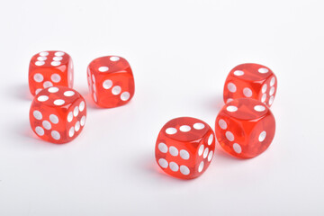 Many red dices isolated on white background