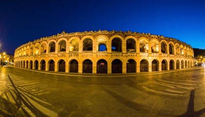 Naklejka premium A grand plaza filled with intricate light patterns projected onto ancient stone walls.