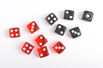 Black and red dices isolated on white background, top view