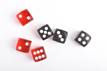 Black and red dices isolated on white background, top view