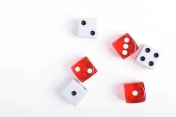 Red and white dices isolated on white background, top view