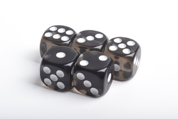 Many black dices isolated on white background