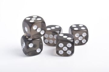 Many black dices isolated on white background