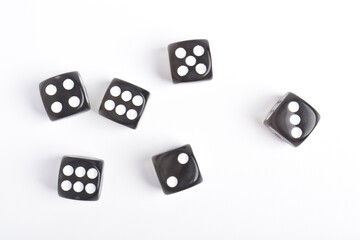 Black dices isolated on white background, top view