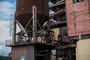 Abandoned Heavy Industrial Ruins with Large Blast Furnace in Steelworks
