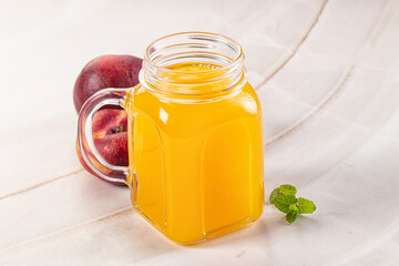 Vitamin beverage - peach juice glass
