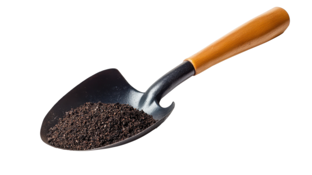 A metal shovel filled with rich black soil rests on a white surface, ideal for planting or garden preparation
