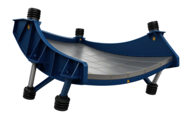 Banana screen with a curved deck and high-capacity throughput for an iron ore processing facility.