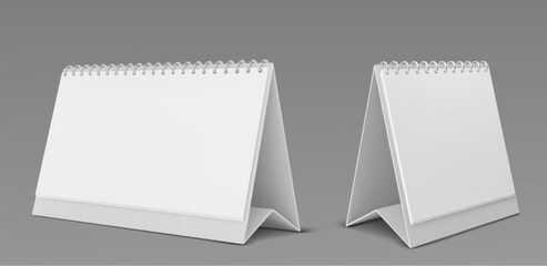 Paper calendar mockup set with spiral binding and standing desk format for office planning. Realistic white blank sheets ready for customization or printing. Professional stationery design elements.