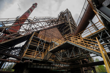 Abandoned Heavy Industrial Ruins with Large Blast Furnace in Steelworks