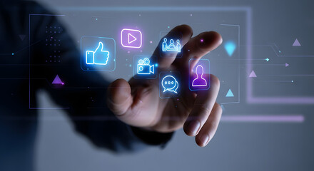 hand pushing a button on a touch screen interface , businessman working on laptop computer