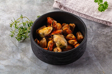 Peeled mussels heap in the bowl