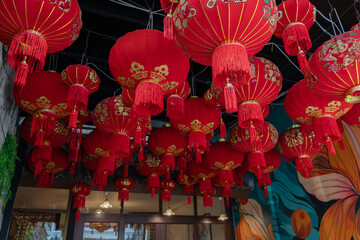 Many Red Chinese Lanterns Hanging in Restaurant at Phuket Old Town Thailand.