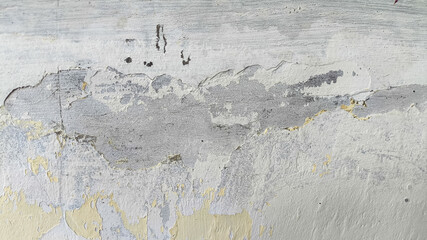 Crumbling wall texture with horizontal lines and surface scratches, ideal for creating a damaged material feel or textured design background.