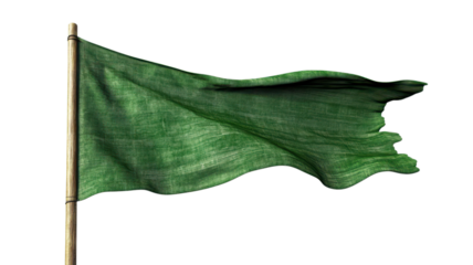 A green flag flutters energetically in the breeze in a vast open space under a bright blue sky