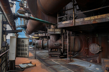 Abandoned Heavy Industrial Ruins with Large Blast Furnace in Steelworks