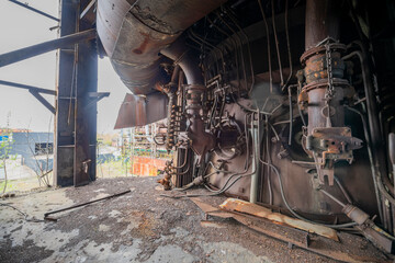Abandoned Heavy Industrial Ruins with Large Blast Furnace in Steelworks