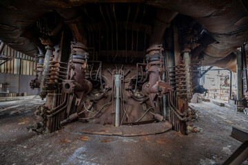 Abandoned Heavy Industrial Ruins with Large Blast Furnace in Steelworks