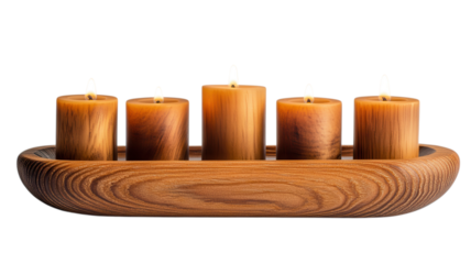 Five beautifully crafted candles rest in a wooden tray, creating a warm and inviting ambiance in the living space