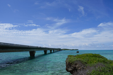 Obraz premium Long Bridge Connecting Islands with Cobalt Blue Sea and Clear Sky, Miyakojima, Japan