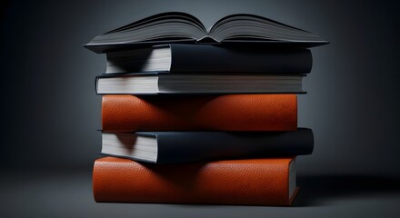 Stack of old books with open cover on dark background