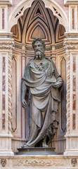 Florence - The bronze statue St. John the Baptist on the facade of Orsanmichele by Lorenzo Ghiberti (1414-1416).