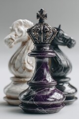 Fototapeta premium Elegant Chess Pieces Showcasing Intricate Metal and Marble Designs