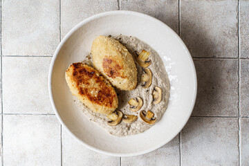 cutlets with mushroom puree and champignons