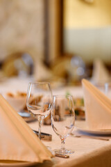 table setting with cutlery and glasses