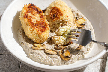 cutlets with mushroom puree and champignons