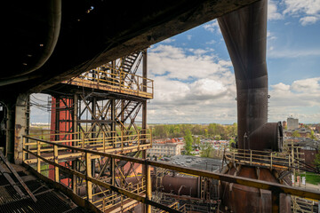 Fototapeta premium Abandoned Heavy Industrial Ruins with Large Blast Furnace in Steelworks