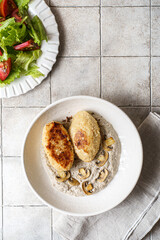 cutlets with mushroom puree and champignons