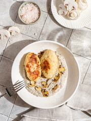 cutlets with mushroom puree and champignons