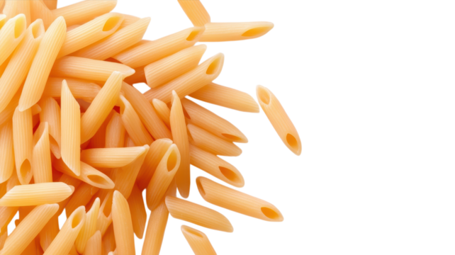 Delicious penne rigate pasta scattered on a clean white surface, highlighting its unique shape and texture