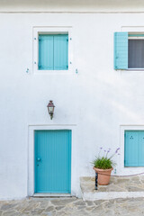 Kouloura Corfu Greece blue and white house facade