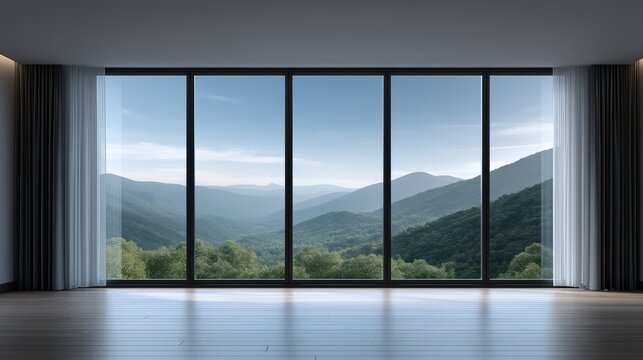 Fototapeta Spacious room with large windows overlooking mountain landscape