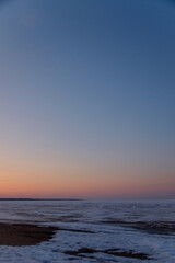 Fototapeta premium sunset on a lake with unusual colors