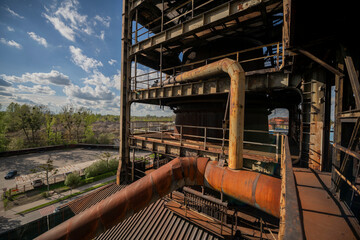 Abandoned Heavy Industrial Ruins with Large Blast Furnace in Steelworks