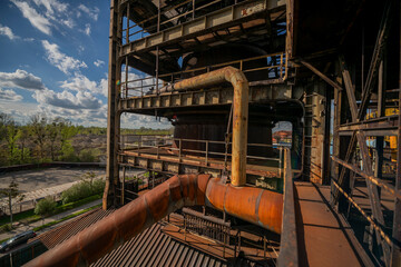 Abandoned Heavy Industrial Ruins with Large Blast Furnace in Steelworks