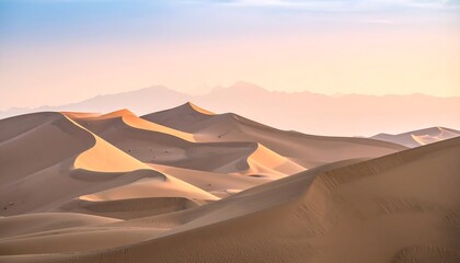 Serene Desert Dunes at Sunrise with Soft Hues
