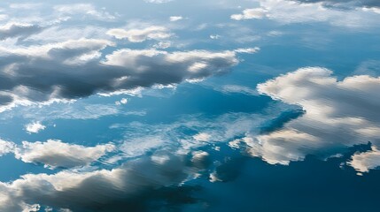 Tranquil Reflection of Soft Clouds in a Blue Sky at Dusk with Serene Atmosphere