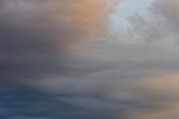 Blue sky with clouds in the evening over the city, isolated