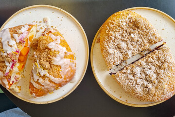 Delicious Assortment of Fruit-Filled Pastries with Icing and Crumb Topping