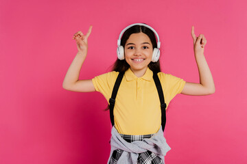 Stylish preteen girl ready for an exciting school day in a vibrant studio
