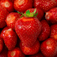 Juicy seasonal strawberries close up macro texture