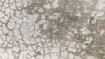 Eroded concrete texture of stained and cracked wall. Aged and weathered appearance for realistic overlays.