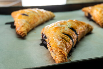 Blueberry and Apricot Jam Triangles Pie. Puff Pastry. Dessert